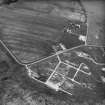 Hoy, Ore Farm, oblique aerial view, taken from the WSW, centred on the ammunition storage huts.