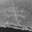 Oblique aerial view  of Orkney, Flotta, 'Z' anti-aircraft battery and accommodation camp, taken from the N.  Also visible is a barrage balloon mooring site.