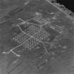 Oblique aerial view of Orkney, Flotta, 'Z' anti-aircraft battery and accommodation camp, taken from the SE. Also visible is a dummy anti-aircraft battery.
