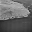 Oblique aerial view of Houton Head coastal battery, from SW.  Visible are the two gun-emplacements, battery observation post, magazines and searchlight platforms.