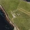 Oblique aerial view of Orkney, Lamb Holm, Italian Chapel and the remains of the prisoner-of-war camp, taken from the W.
