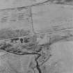 Oblique aerial view of Orkney, Hoy, Lyness, Royal Naval Oil Terminal, view from E, concrete hut bases of the RMAU camp and part of the site of the RME camp.