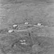 Oblique aerial view of Orkney, Hoy, taken from the SE, Rysa Lodge heavy anti aircraft battery, H6, with four gun emplacements and command centre. The gun emplacements have been covered with a modern roof to provide shelter for animals.