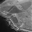 Hackness, oblique aerial view, taken from the N, centred on the Martello Tower, with The Battery shown in the bottom half of the photograph.