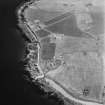 Hackness, oblique aerial view, taken from the NNW, centred on the Martello Tower and The Battery, with Walls Battery shown at the top edge of the photograph.