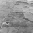 South Walls, oblique aerial view, taken from the NE, centred on Stromabank Anti-aircraft Battery and Military Camp, with Gallow Tuag Radio Site in the background.