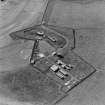 Oblique aerial view of the Second World War Ness Battery, taken from the N.  Visible are the two gun-emplacements, battery observation post, and extant crew accommodation camp.