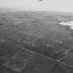 Aerial view of Orkney, Isbister, taken from the NE, Twatt airfield, runways, perimeter track, aircraft hangar bases, dispersal bays and bomb store.