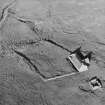Oblique aerial view centred on the croft buildings, taken from the WSW.