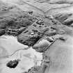 Oblique aerial view of Sorisdale centred on cottages, taken from the ENE.