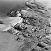 Oblique aerial view of Sorisdale centred on cottages, taken from the N.