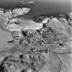 Oblique aerial view of Sorisdale centred on cottages, taken from the NW.