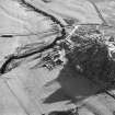 Oblique aerial view centred on the farmstead, taken from the NNW.