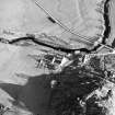 Oblique aerial view centred on the farmstead, taken from the WNW.