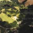 Oblique aerial view centred on the country house and gardens, taken from the SSW.