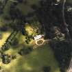 Oblique aerial view centred on the country house and gardens, taken from the W.