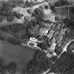 Oblique aerial view centred on the country house and gardens, taken from the SW.