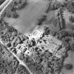 Oblique aerial view centred on the country house and gardens, taken from the SE.