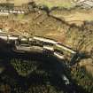 Oblique aerial view centred on the village of New Lanark, taken from the SSW.