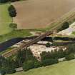 Oblique aerial view centred on the railway bridge, taken from the SSE.