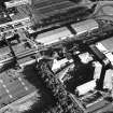 Oblique aerial view of Cumbernauld centred on St Mungo's Church in the town centre, taken from the NNW and recorded as part of the World of Worship project.