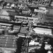 Oblique aerial view of Cumbernauld centred on St Mungo's Church in the town centre, taken from the NW and recorded as part of the World of Worship project.