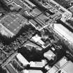 Oblique aerial view of Cumbernauld centred on St Mungo's Church in the town centre, taken from the W and recorded as part of the World of Worship project.
