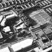 Oblique aerial view of Cumbernauld centred on St Mungo's Church in the town centre, taken from the SSE and recorded as part of the World of Worship project.