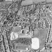 Oblique aerial view of Kilsyth centred in the school, taken from the ENE.