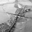 Oblique aerial view centred on the railway viaduct, taken from the SW.