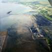 General oblique aerial view looking across the ore terminal towards Fairlie and Largs, taken from the SW.