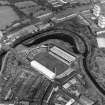 Maryhill, oblique aerial view, centred on Firhill Park and the Forth and Clyde Canal.