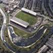 Maryhill, oblique aerial view, centred on Firhill Park and the Forth and Clyde Canal.