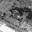 Oblique aerial view of Saint Teresa of Lisieux Roman Catholic Church.