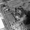 Oblique aerial view of Saint Teresa of Lisieux Roman Catholic Church.