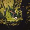 Oblique aerial view of Bothwell centred on the remains of the castle, taken from the WNW.