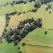 Oblique aerial view centred on the Museum of Scottish Country Life and farmsteading, taken from the WNW.