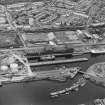 Greenock, James Watt Dock, oblique aerial view, taken from the NE. Cappielow is visible in the centre of the photograph.