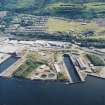 Oblique aerial view looking across the shipyard and the dry docks towards Port Glasgow, taken from the N.
