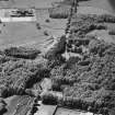 Aerial view of Loudoun Castle, gardens, estate policies and fairground, taken from the ENE.
