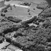 Aerial view of Loudoun Castle, gardens, estate policies and fairground, taken from the NE.
