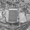 Oblique aerial view centred on the football stadium, taken from the WNW.