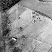 Oblique aerial view centred on the remains of an anti-aircraft battery, taken from the SSW.