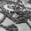 Formakin, oblique aerial view, taken from the NE, centred on Formakin House. Formakin Mill, and out-buildings of Formakin House, are visible in the top left-hand corner of the photograph.