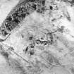 Oblique aerial view centred on the remains of the anti-aircraft battery with traces of the camp adjacent, taken from the S.