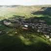 General oblique aerial view centred on the town, taken from the S.