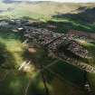 General oblique aerial view centred on the town, taken from the SSE.