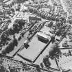 Oblique aerial view centred on the football ground, taken from the E.