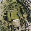 Oblique aerial view centred on the football ground, taken from the NW.