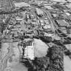 General oblique aerial view of the factory with the industrial estate adjacent, taken from the W.